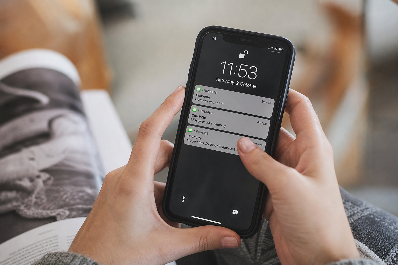 Hands holding smartphone with messages